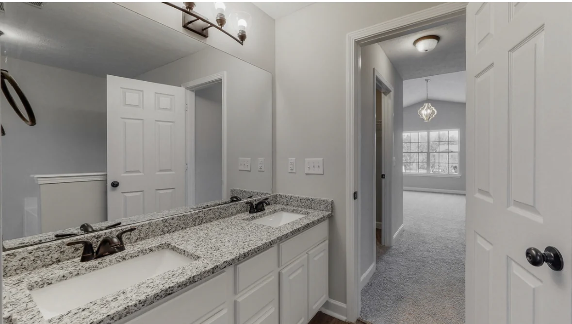 Bathroom with double vanity in the Mount Juliet home